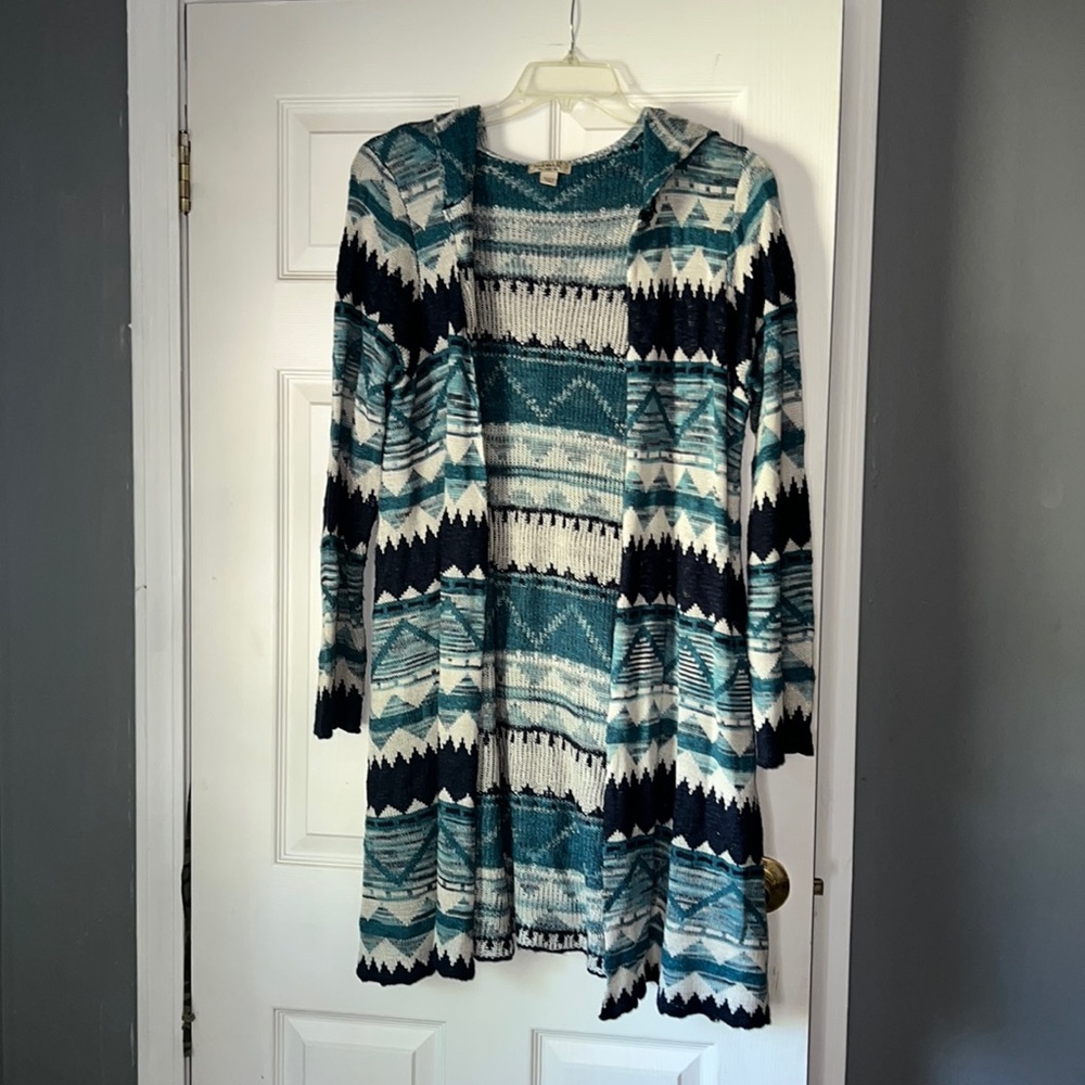 Multiple colored cardigan. Navy blue cream, teal.